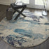 2' X 4' Ivory And Teal Blue Abstract Power Loom Non Skid Area Rug